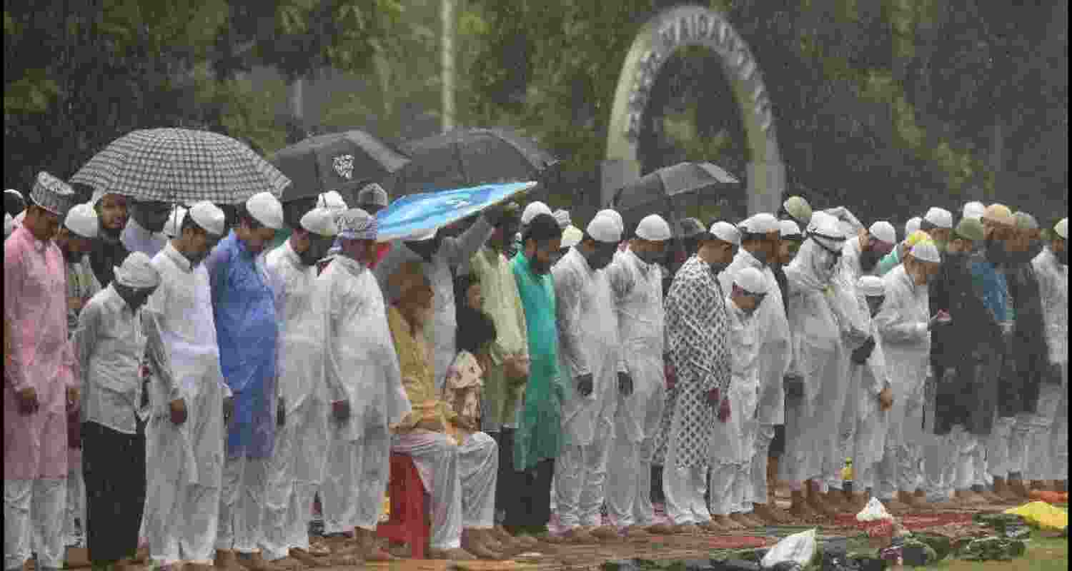 People offering namaz.