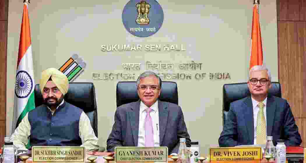 Chief Election Commissioner Gyanesh Kumar along with Election Commissioners Sukhbir Singh Sandhu (L) and Vivek Joshi (R).