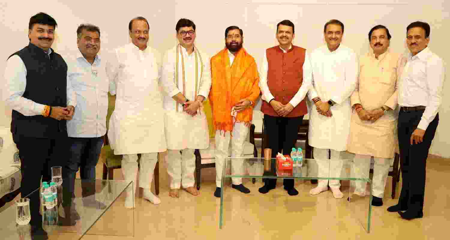 Maharashtra CM-designate Devendra Fadnavis with Shiv Sena leader Eknath Shinde, NCP leader Ajit Pawar and others during a meeting, in Mumbai.
