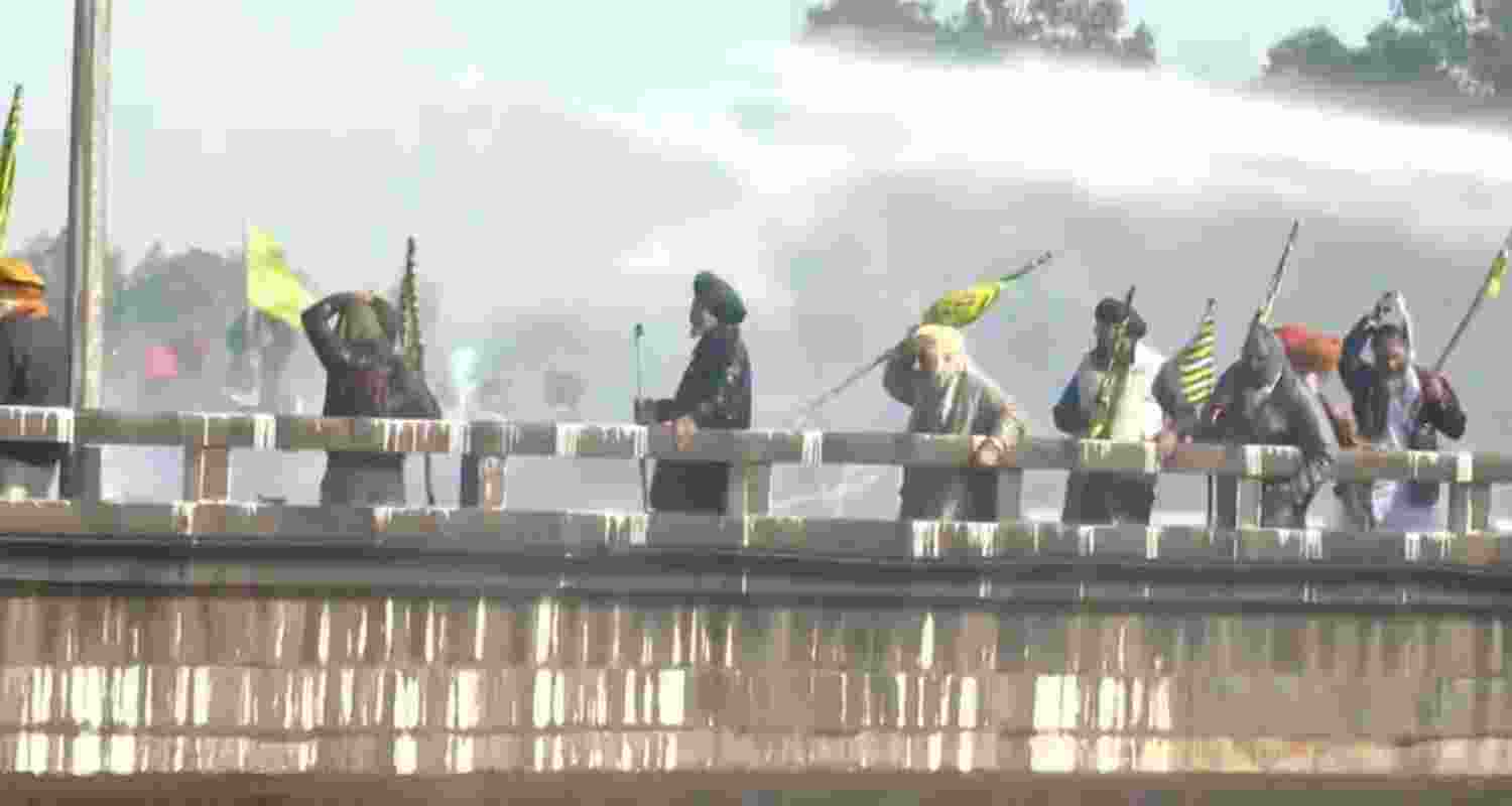 Farmers face tear gas and water cannons as they resume their march to Delhi. 