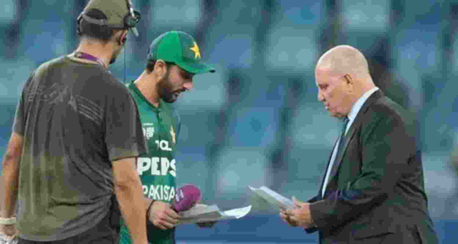 A file photograph of match referee Andy Pycroft with the captains of India and Pakistan during their match last Sunday. A file photograph of match referee Andy Pycroft with the captains of India and Pakistan during their match last Sunday.