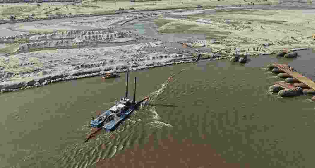 A Cleantec Infra trash skimmer in operation at the Maha Kumbh site, contributing to a record-setting 600-tonne clean-up initiative.