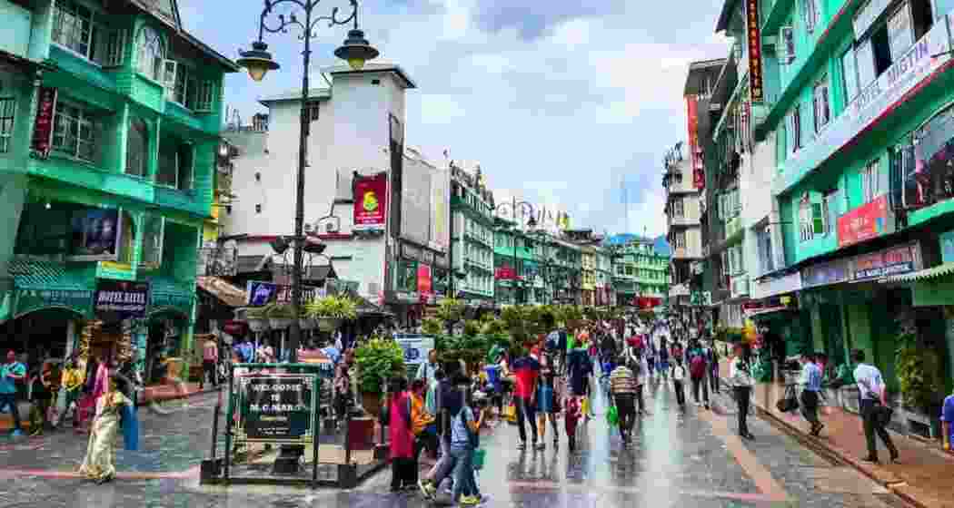 People stroll along MG Road in Gangtok, the capital of Sikkim. The state has replaced physical permits with mandatory online clearance for foreign tourists visiting sensitive border regions.
