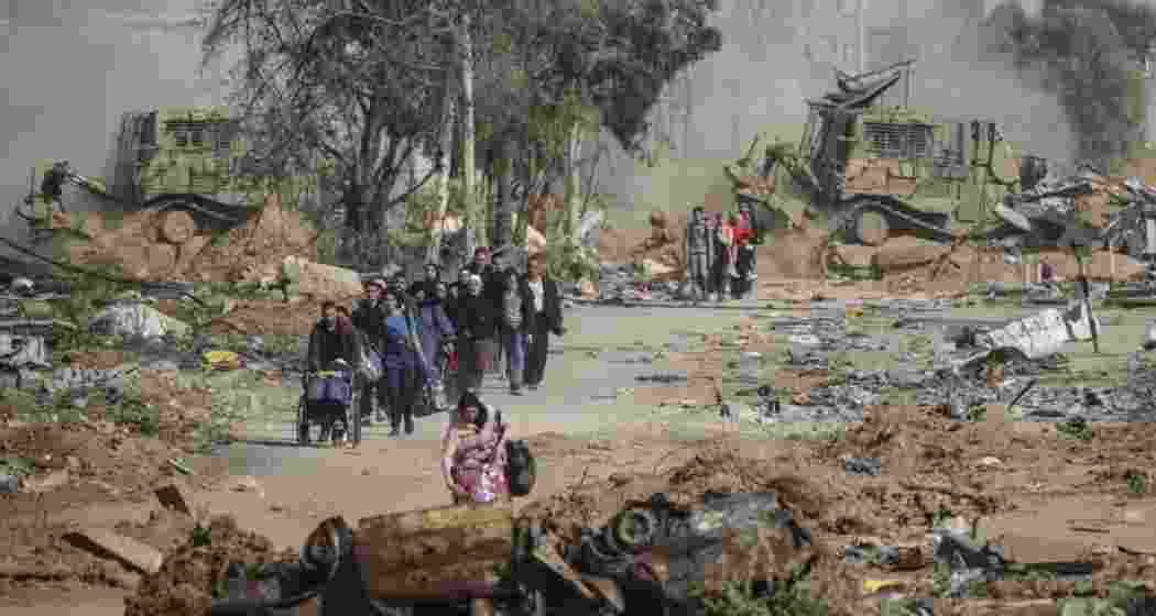 The Israeli military has killed at least 67 people waiting for UN aid lorries in northern Gaza.