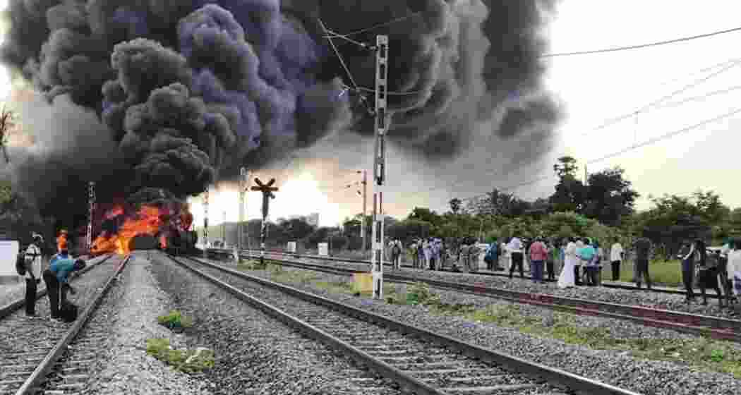 Flames and black smoke engulf a diesel tanker on a goods train near Tiruvallur, disrupting several Chennai-bound services as Southern Railway switches off overhead power. 