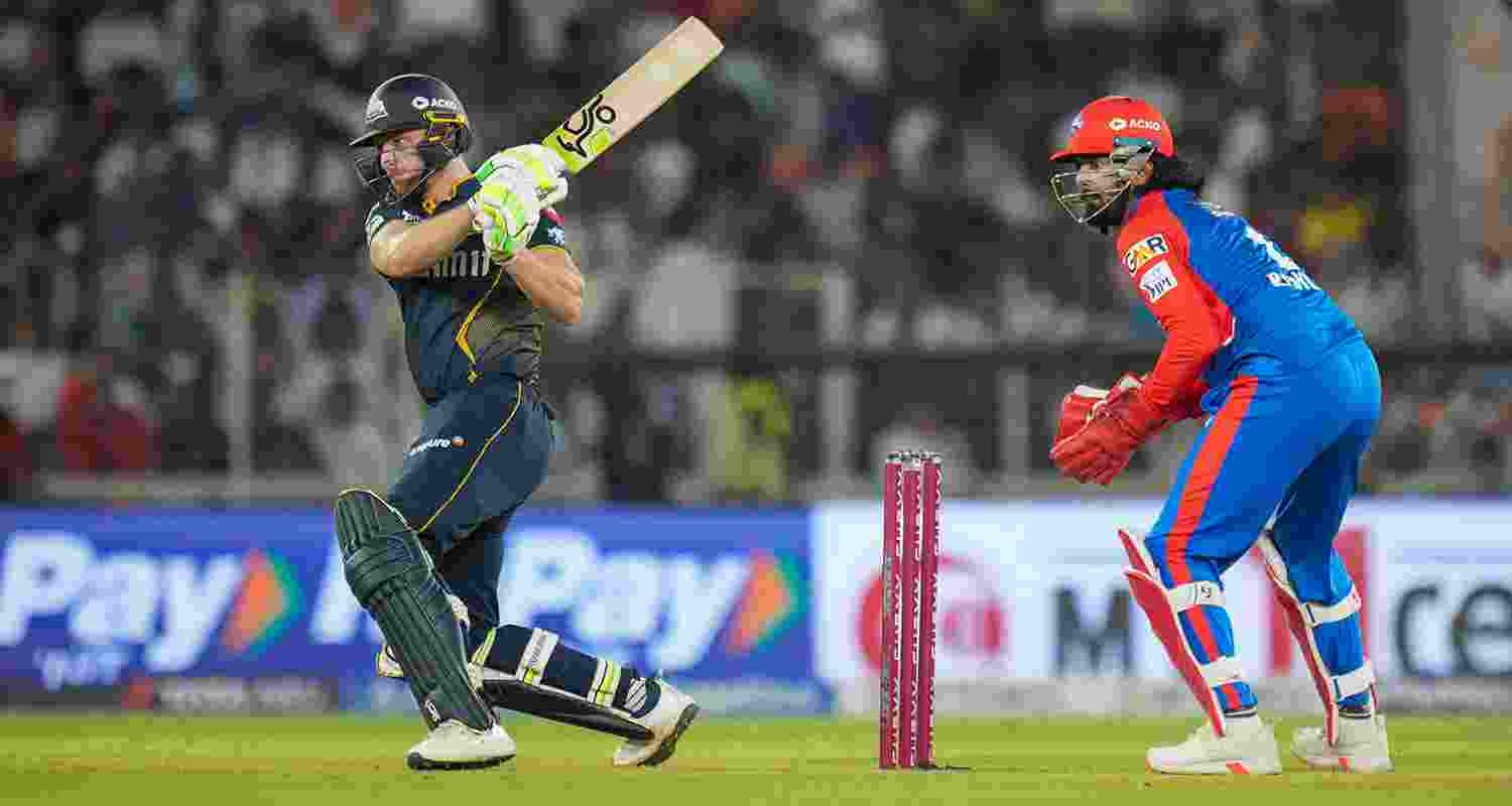 Gujarat Titans' batter Jos Buttler plays a shot during the Indian Premier League (IPL) 2025 cricket match between Gujarat Titans and Delhi Capitals, at Narendra Modi Stadium, in Ahmedabad, Gujarat, Saturday,