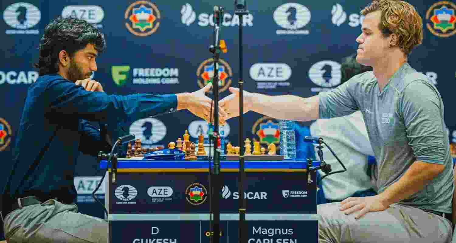 D Gukesh and Magnus Carlsen at a match in 2023.