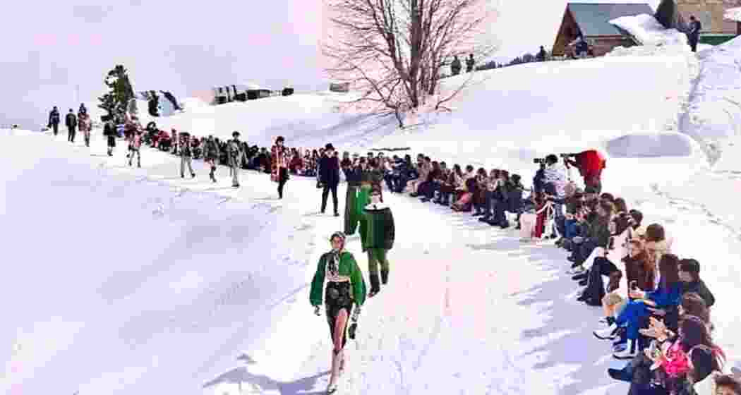 Models walk the runway at the Gulmarg fashion show, showcasing Shivan & Narresh's latest ski wear collection against the stunning snow-covered backdrop of the famous winter destination.