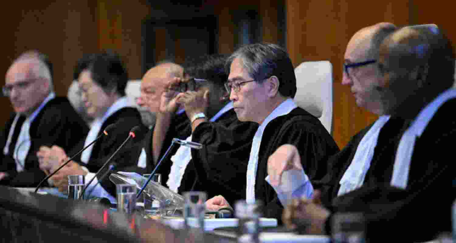 Yuji Iwasawa (center), president of the International Court of Justice, issues the first advisory opinion on States’ legal obligations to address climate change in The Hague on Wednesday. 