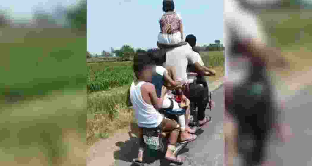 The curious incident in Hapur was captured by a person on a bike right behind the two-wheeler.