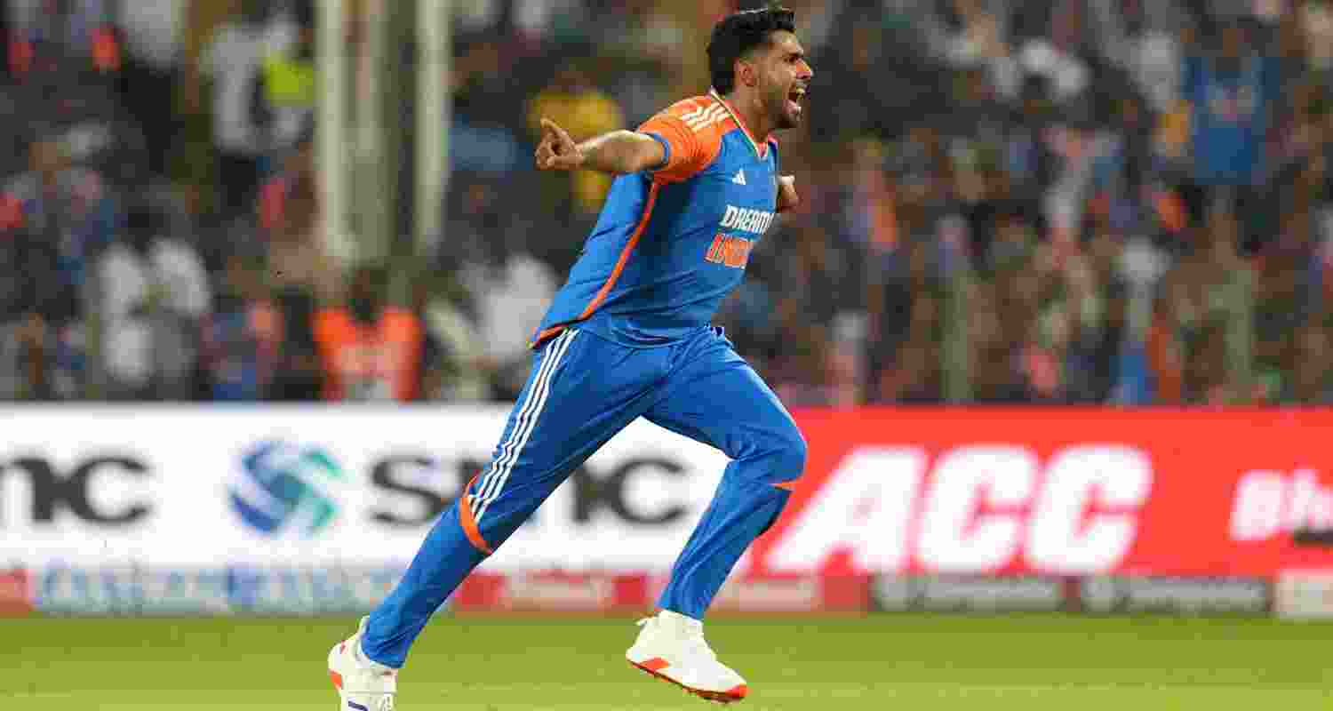 T20 debutant Harshit Rana celebrates his third wicket. Rana was brought in as a substitute after Shivam Dube was called off field due to a concussion.