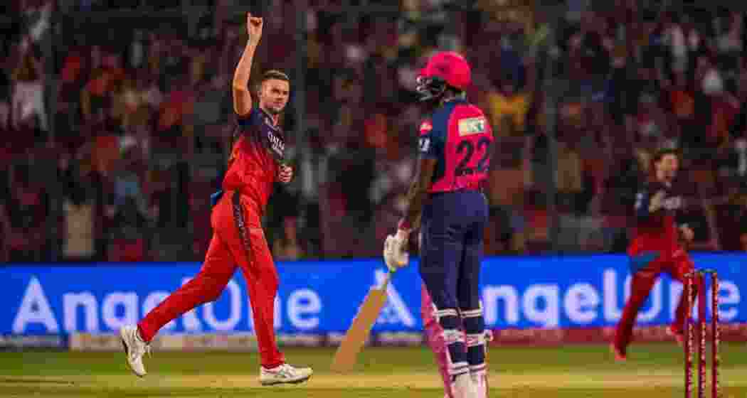 Josh Hazlewood celebrates a breakthrough during his match-winning 4-wicket haul at Chinnaswamy Stadium, helping RCB edge out Rajasthan Royals and secure their first home victory of the IPL season