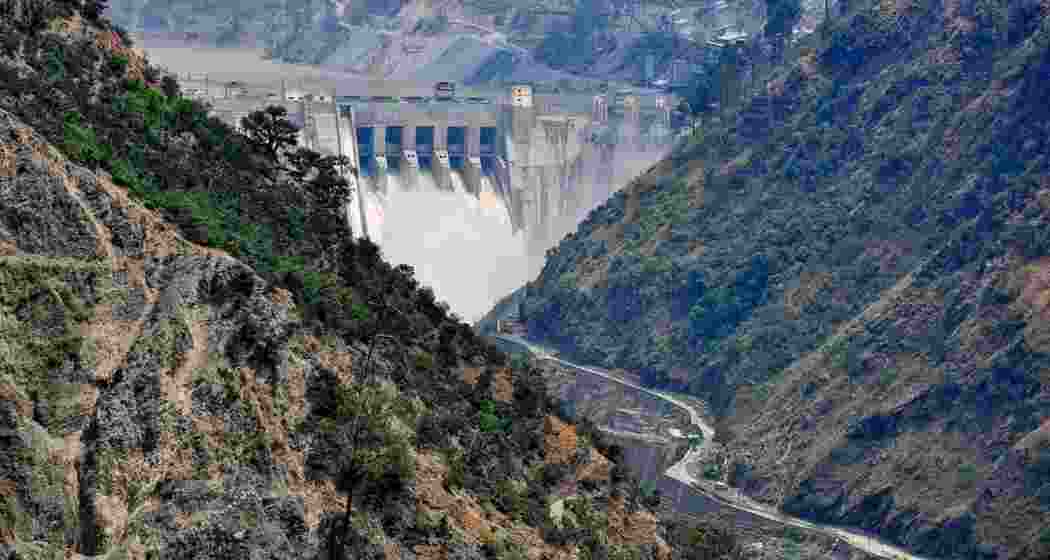 Floodwaters rise near the Baglihar Hydroelectric Project in Ramban as the Chenab River swells dangerously, prompting warnings and rescue operations after rain-related casualties in Jammu’s Doda district.