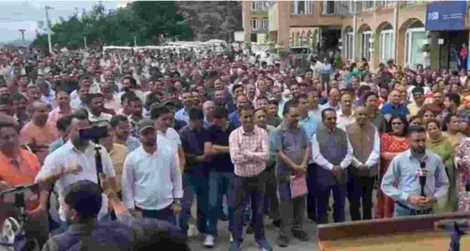 Secretariat employees gather for General House in the State Secretariat compound in Shimla today.
