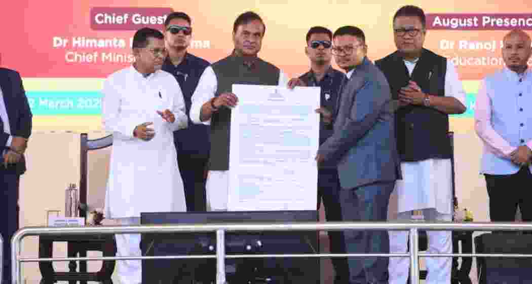 Assam Chief Minister Himanta Biswa Sarma distributes an appointment letter to a newly appointed teacher in Guwahati on Thursday.