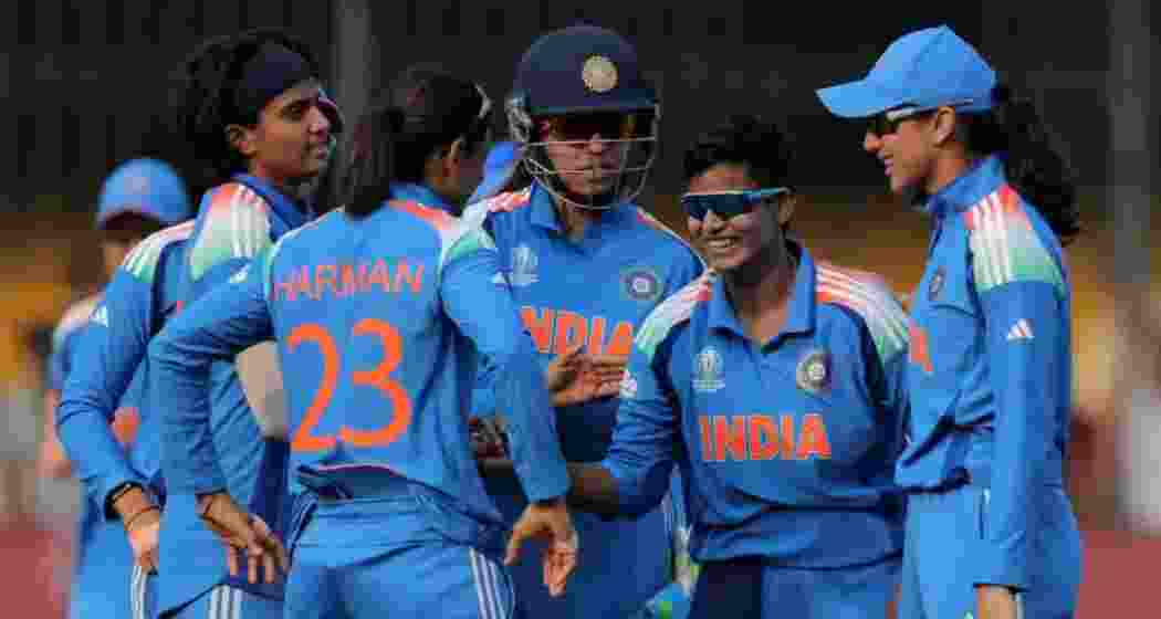 Deepti Sharma celebrates after taking a crucial wicket, helping India curb England’s total.