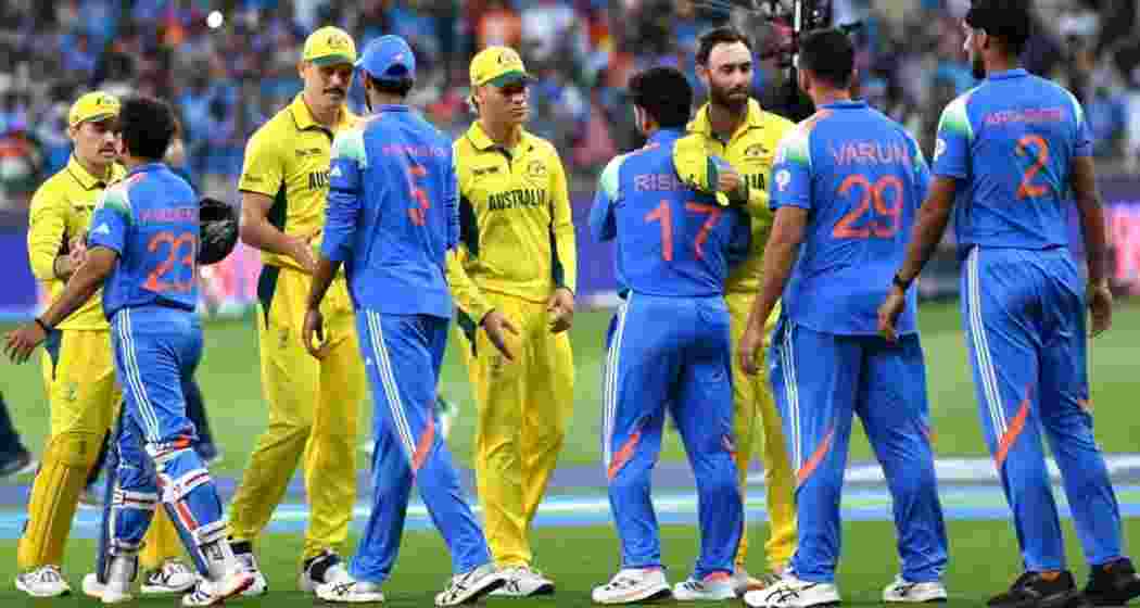 India and Australia players shake hands after a fiercely contested match in Perth.