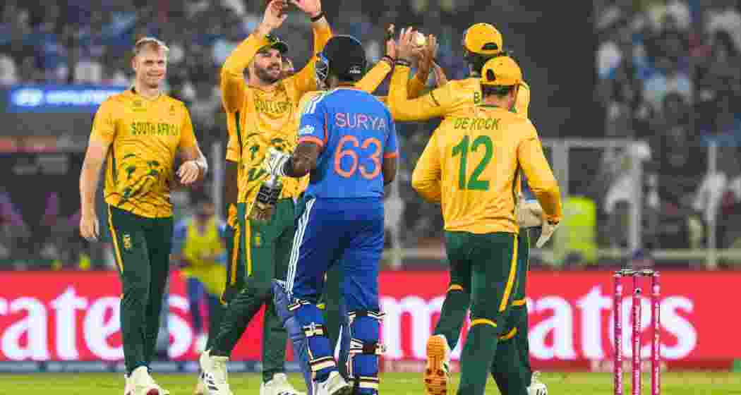 South Africa's Corbin Bosch celebrates with teammates after taking the wicket of India's captain Suryakumar Yadav during an ICC Men's T20 World Cup 2026 cricket match between India and South Africa, at the Narendra Modi Stadium, in Ahmedabad on Sunday.