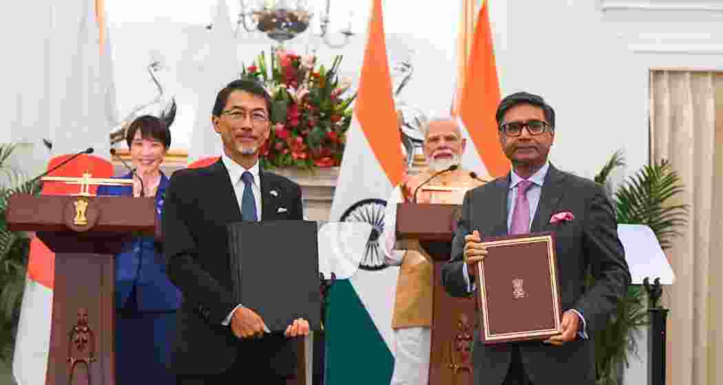 Prime Minister Narendra Modi and Japanese Prime Minister Sanae Takaichi look on as ministers from India and Japan exchange signed agreements and memorandums of understanding at Hyderabad House in New Delhi on Thursday.