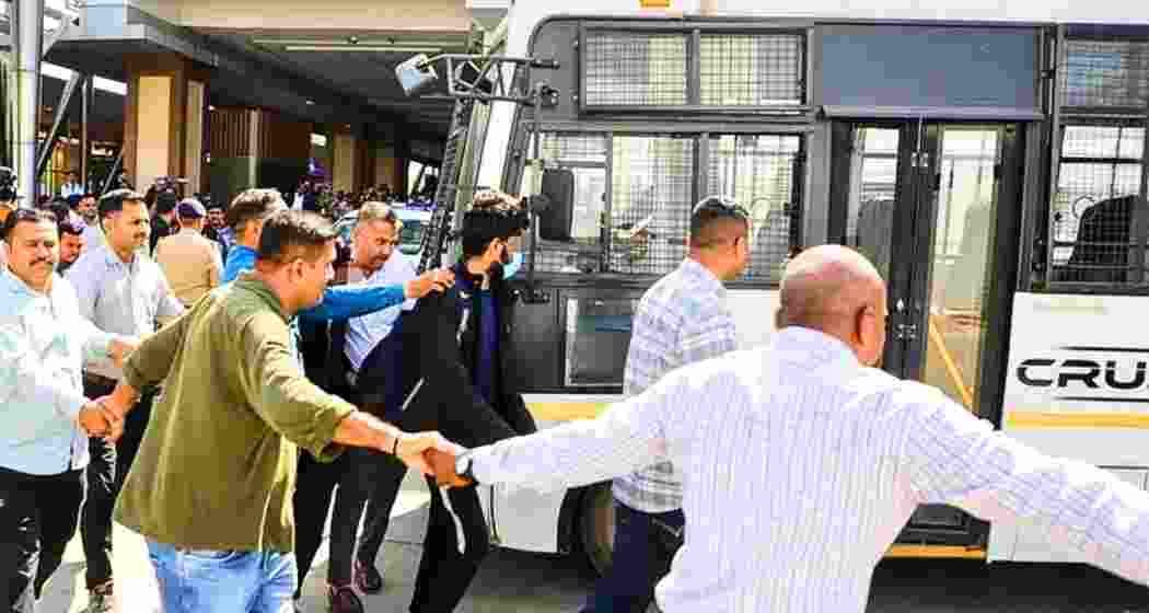 An Indian deportee from the US at Amritsar airport before leaving for their respective states.