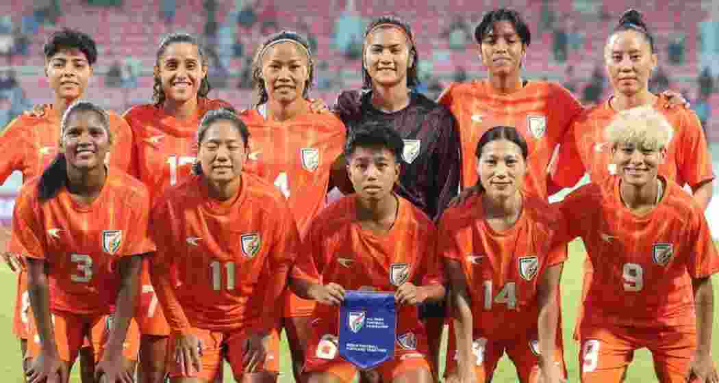 India’s women’s football team members pose for a group photograph.