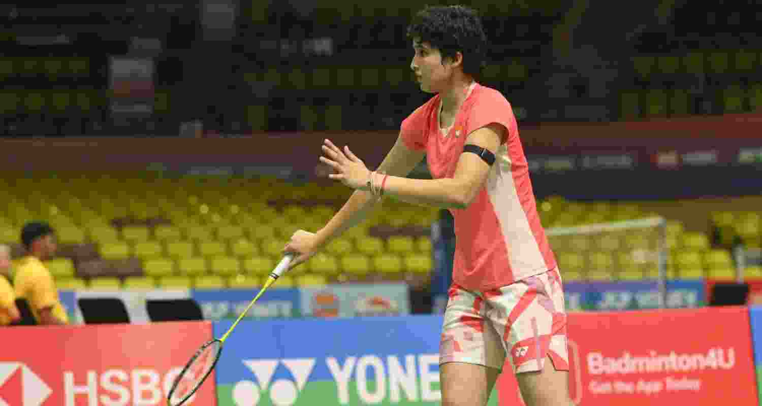 An Indian shuttler in action during their Group H opener against Nepal on Monday.