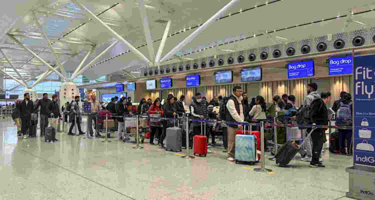 Passengers at Terminal 1 (T1) of the Indira Gandhi International Airport amid improvement in services following IndiGo flight disruptions, in New Delhi, Sunday, Dec. 7, 2025. 