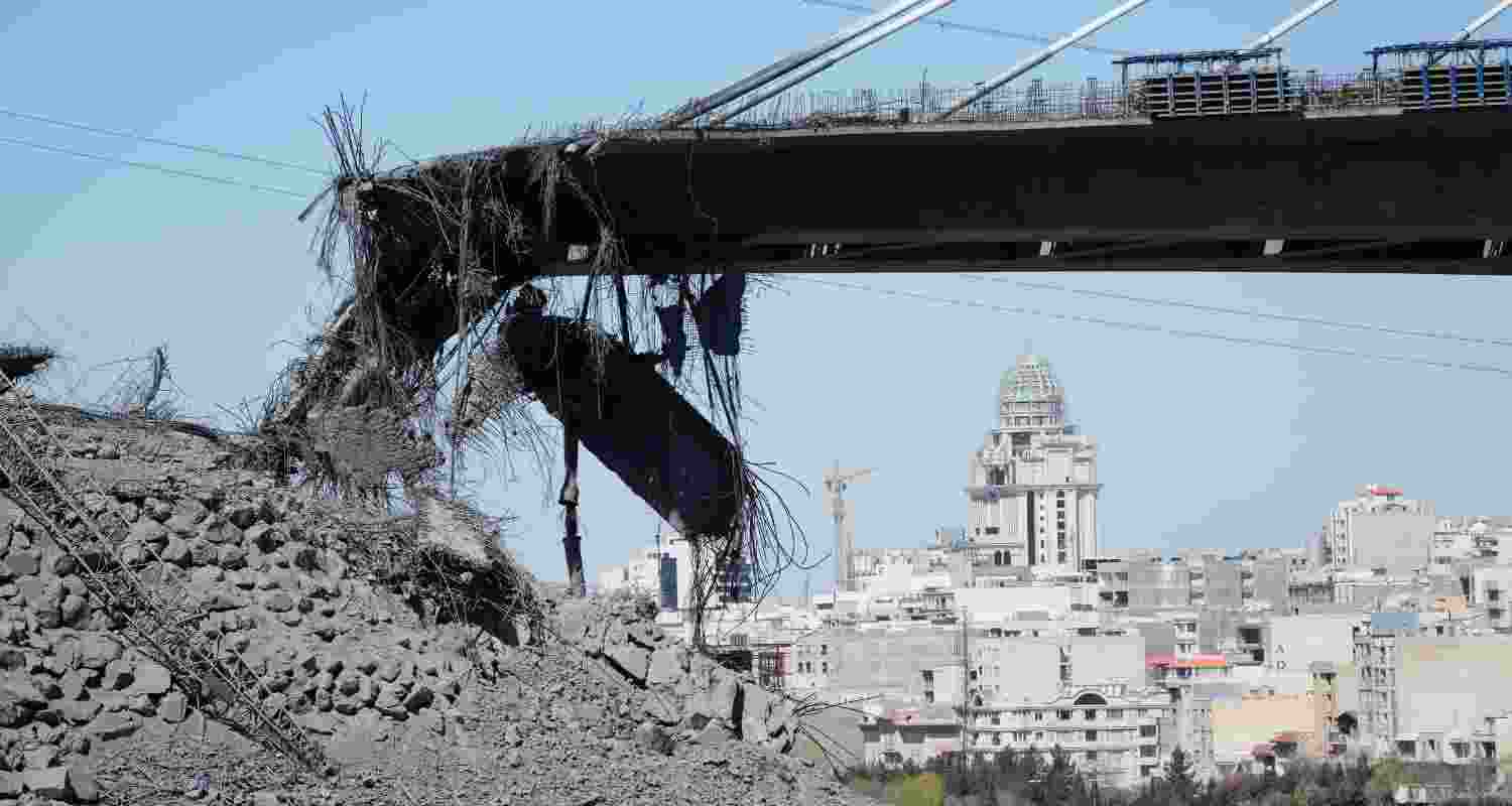 A newly constructed bridge struck by U.S. airstrikes Thursday is seen in Karaj, west of Tehran, Iran, Friday.