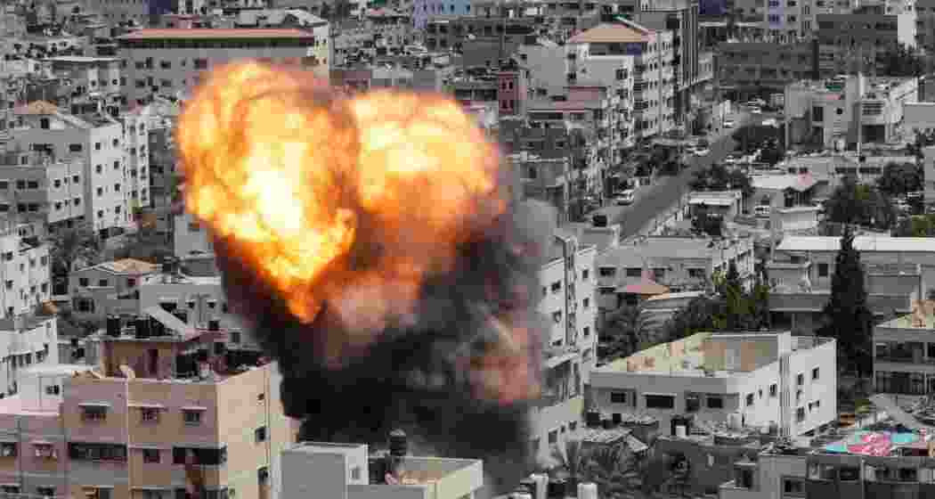 Smoke rises over Gaza following intense Israeli airstrikes. The conflict escalates as ground forces advance, while Palestinian casualties continue to mount.