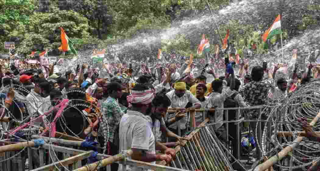 Police personnel used water cannon to disperse demonstrators during an ongoing protest against alleged exam irregularities in Ranchi on August 10.