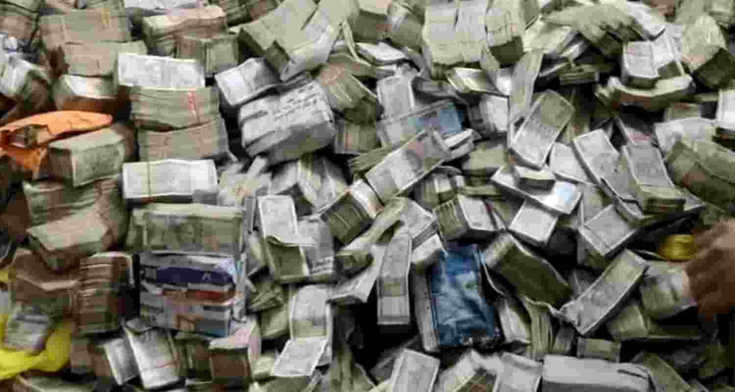 The cash recovered from the premises of Jahangir Alam, the domestic help of Sanjiv Lal, PS to Jharkhand Rural Development Minister Alamgir Alam of the Congress.