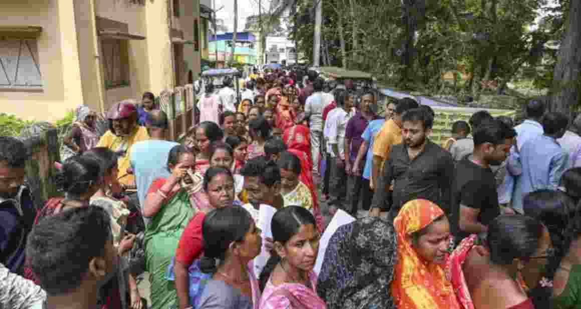 People stand in queue to submit their petitions before the Special Tribunal after their names were deleted from the Special Intensive Revision final voter list of West Bengal - file image. 