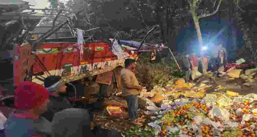 Rescue operations underway following a road accident in Karnataka where a truck fell into a valley, killing nine individuals. (