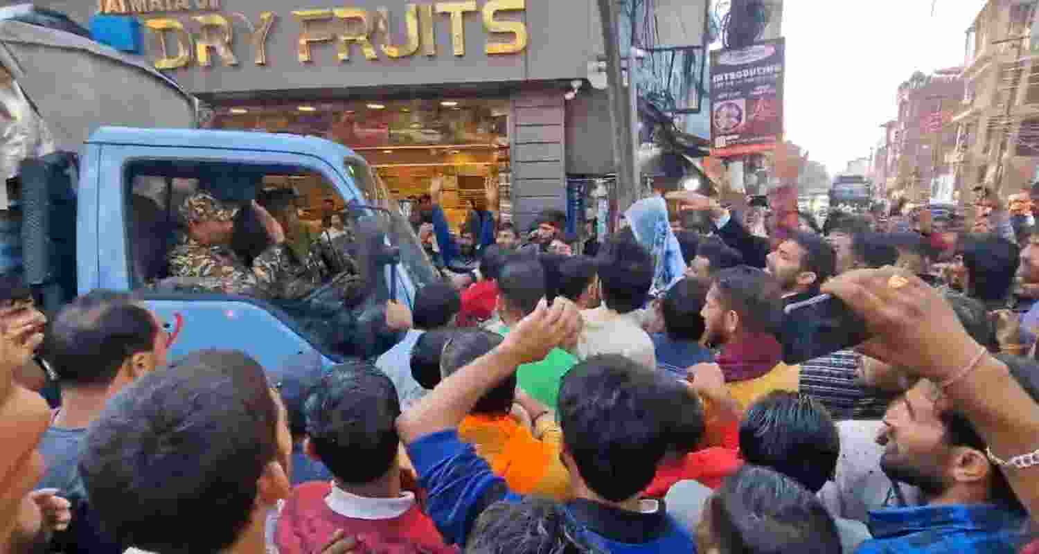 Protestors stop a CRPF vehicle in Katra, Jammu and Kashmir.