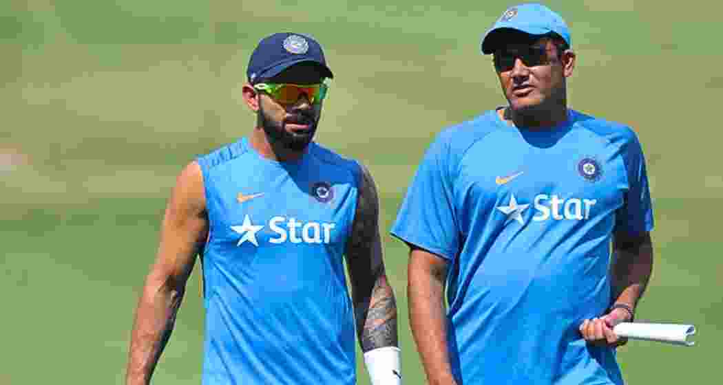 Indian cricketer  Virat Kohli with former India captain and coach Anil Kumble. File photo.