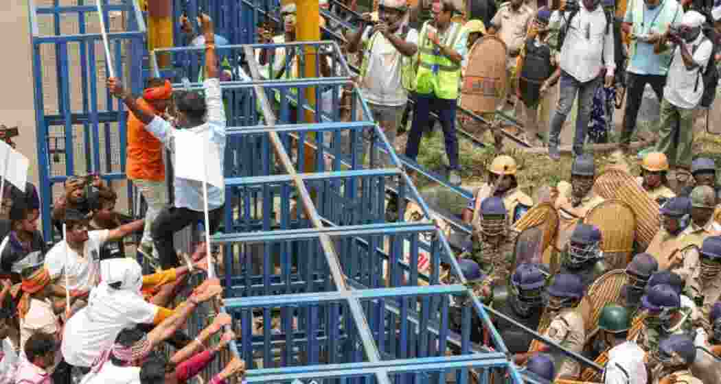 Police had erected iron barricades chained and welded to ensure no protesters could proceed further.