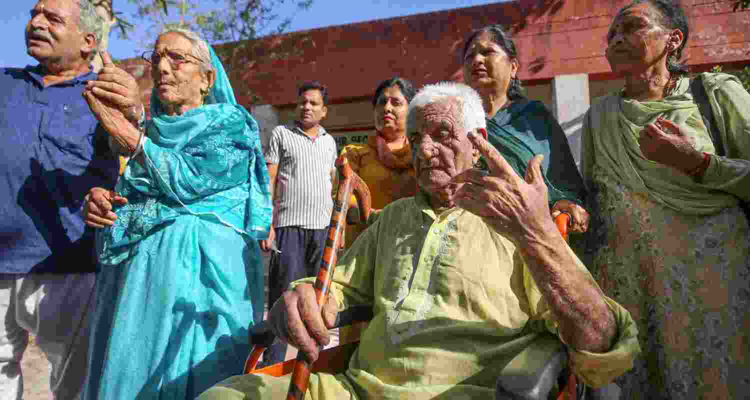 Kashmiri Pandit voters outside a polling station in Jammu.