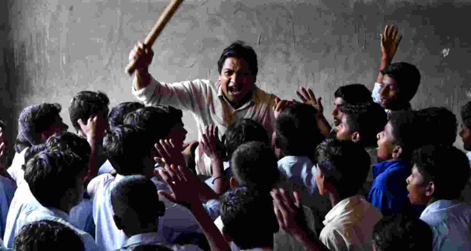 AI-generated Image for reference. Maharashtra teacher arrested after allegedly beating 32 students with a bamboo stick at a Latur hostel over suspicion of damaging his motorcycle.