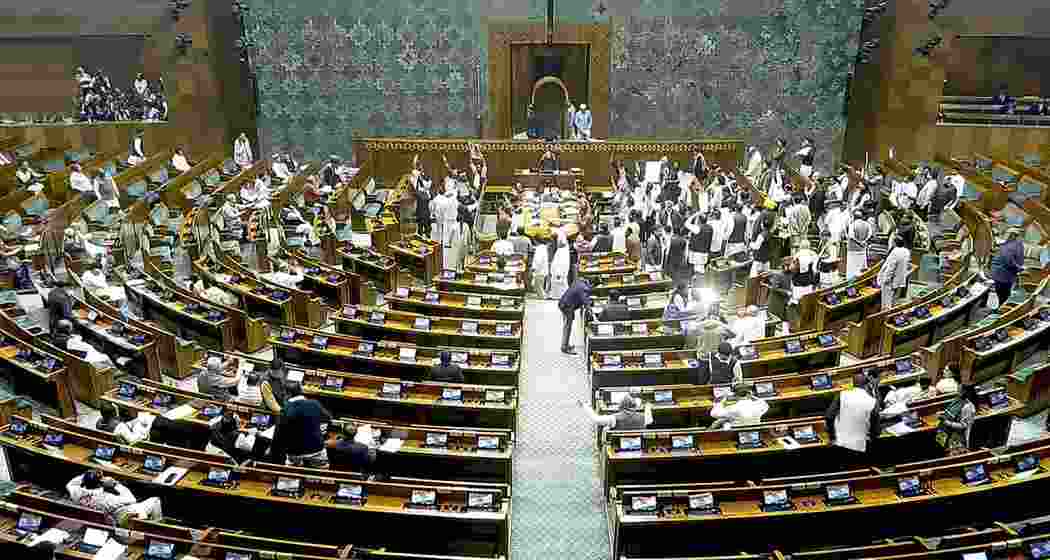 Lok Sabha Speaker Om Birla leaves after adjourning the House amid protests by opposition members during the Winter session of Parliament, in New Delhi on Wednesday, Dec. 18, 2024.