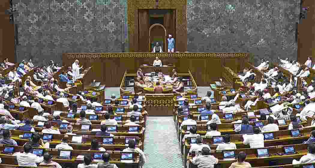 Union Home Minister Amit Shah speaks in the Lok Sabha during the Special session of Parliament, in New Delhi, on Friday.