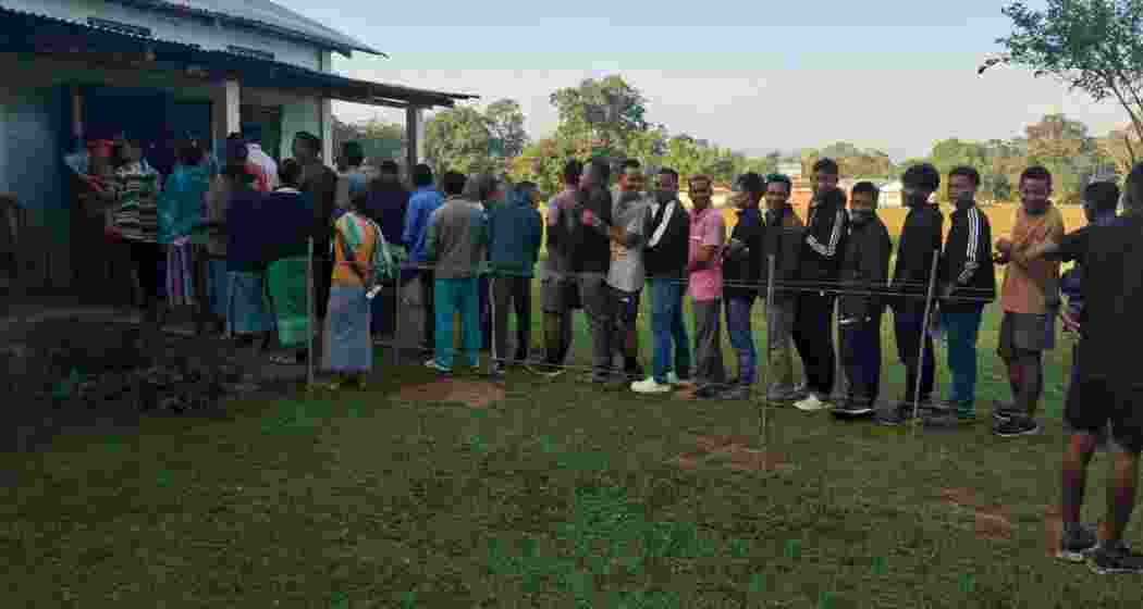 Voters patiently wait in line to cast their ballots in the by-election for the 56-Gambegre (ST) Assembly Constituency, marking an early surge in turnout.