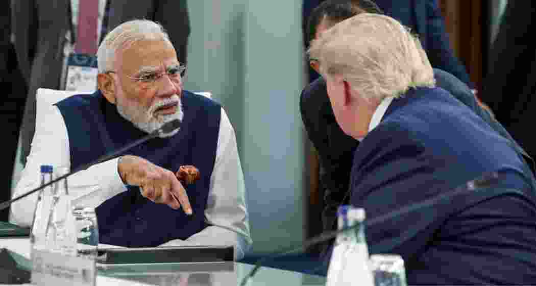 Prime Minister Narendra Modi interacts with US President Donald Trump. (@narendramodi X/ANI Photo)
