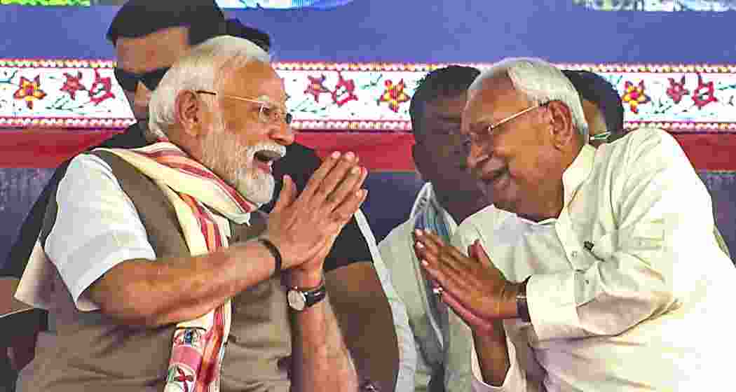 Prime Minister Narendra Modi and Bihar Chief Minister Nitish Kumar during a public meeting, in Rohtas district, Bihar, on Friday.