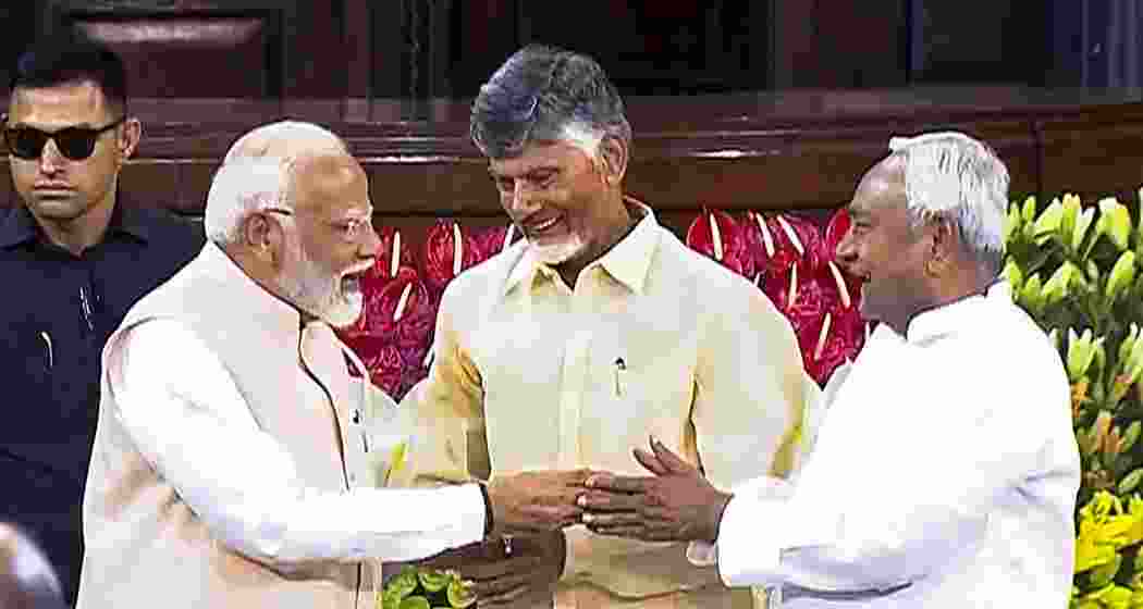 Senior BJP leader Narendra Modi with TDP chief N. Chandrababu Naidu and Bihar CM and JD(U) leader Nitish Kumar during the NDA parliamentary party meeting at Samvidhan Sadan, in New Delhi, Friday, June 7, 2024. 