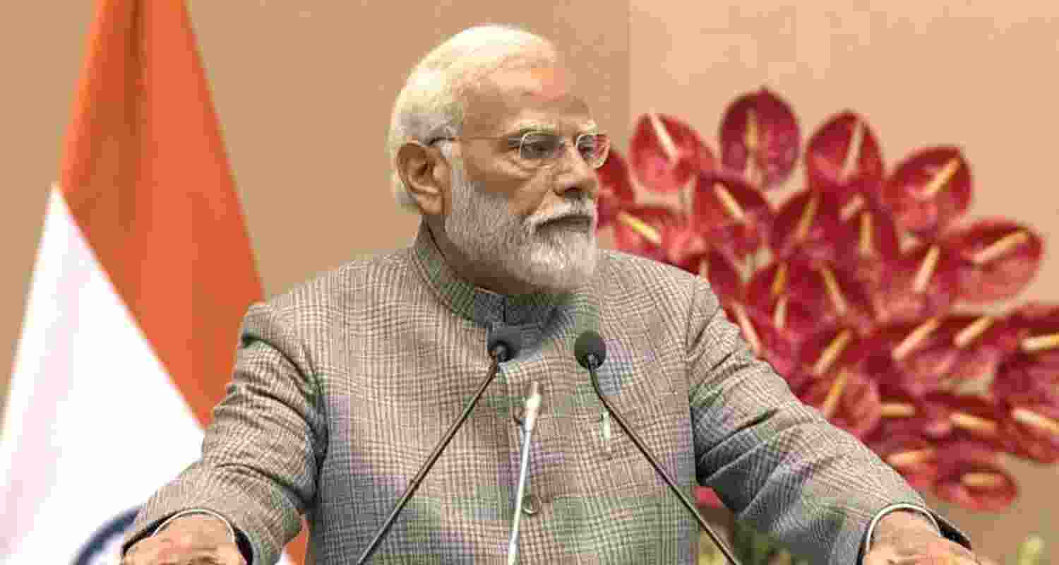 PM Narendra Modi talks to Tamil Nadu BJP workers.