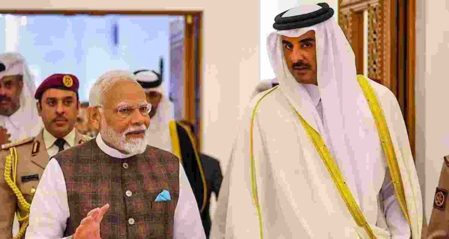 Prime Minister Narendra Modi with Emir of Qatar Sheikh Tamim Bin Hamad. (File photo)