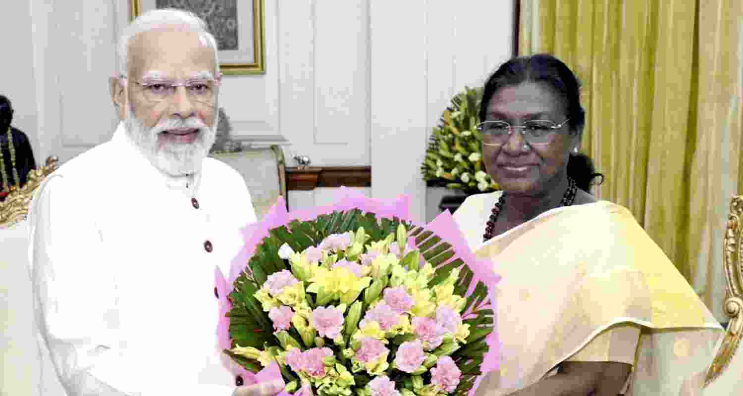 President Droupadi Murmu and Prime Minister Narendra Modi exchange Diwali greetings, in New Delhi.