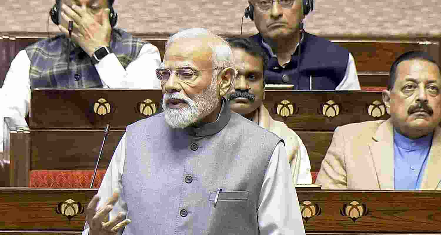 Prime Minister Narendra Modi speaks on the first day of the Winter Session of Parliament, in New Delhi, Monday, Dec. 1, 2025. Union Ministers Jitendra Singh and L Murugan are also seen.