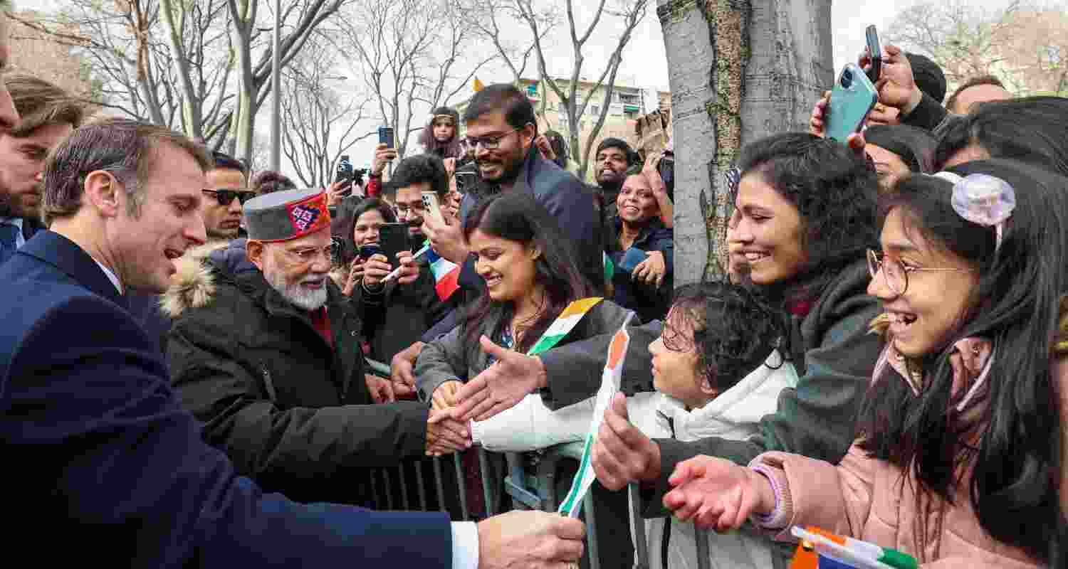 PM Modi and French President Emannuel Macron meet with Indian diaspora in Marseilles, France, Wednesday.