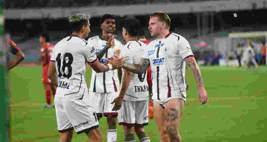 Mohun Bagan SG players celebrate after scoring against Diamond Harbour FC in Durand Cup 2025. 